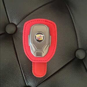 Cadillac visor glasses holder. (NEW)